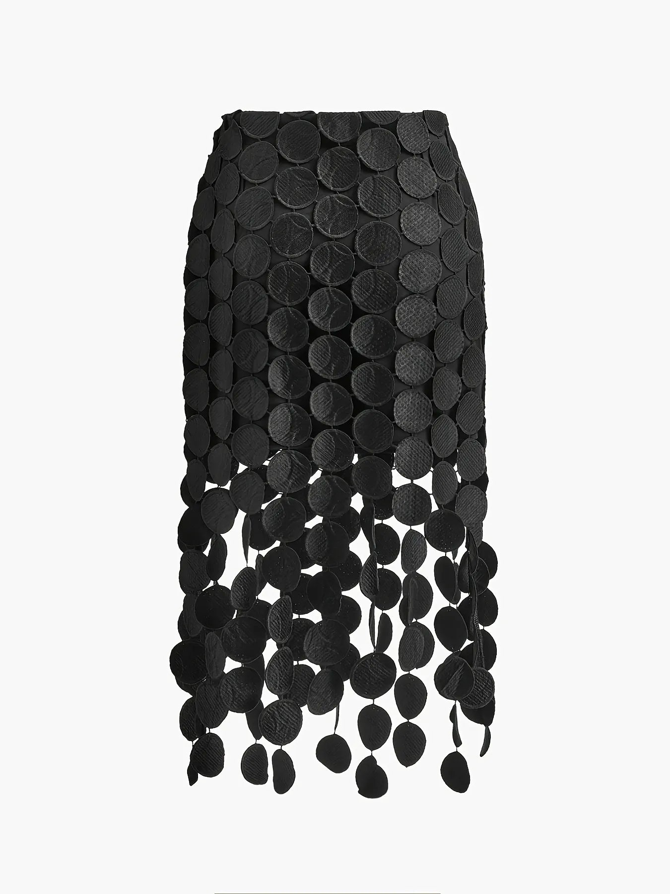 Black skirt with circular patterns and fringe on a white background