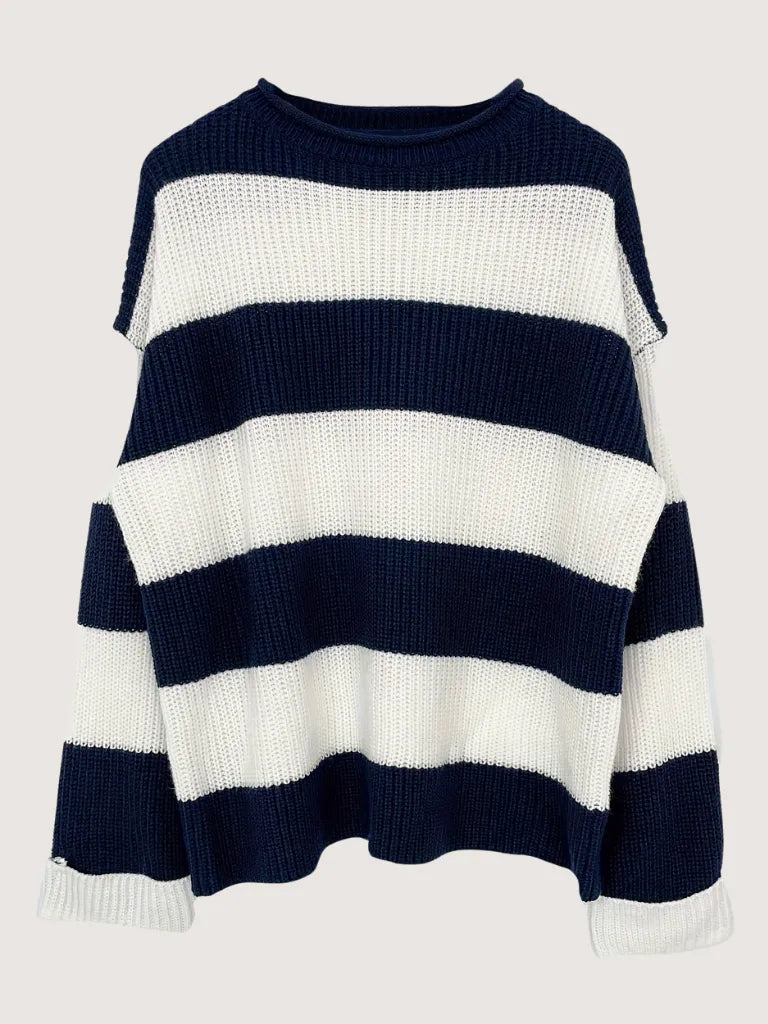 Navy and white striped sweater on a light gray background