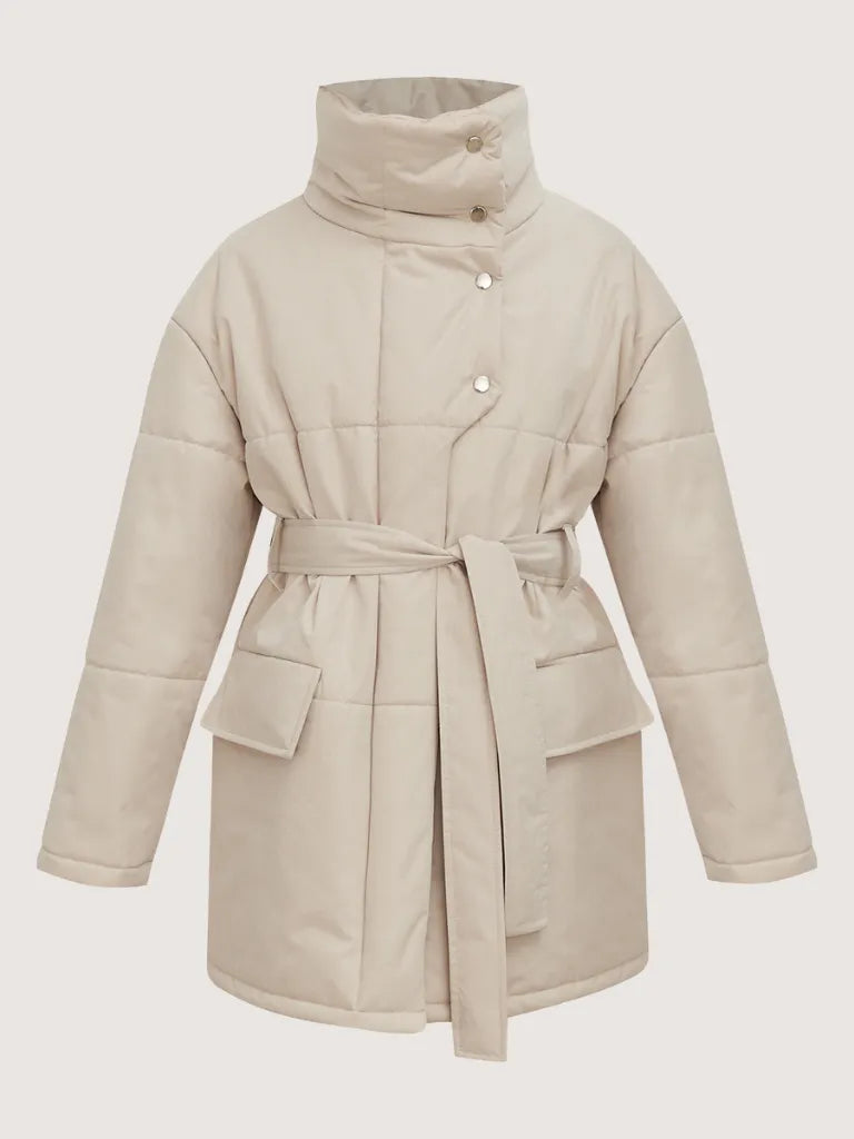Beige puffer coat with a belt on a light gray background