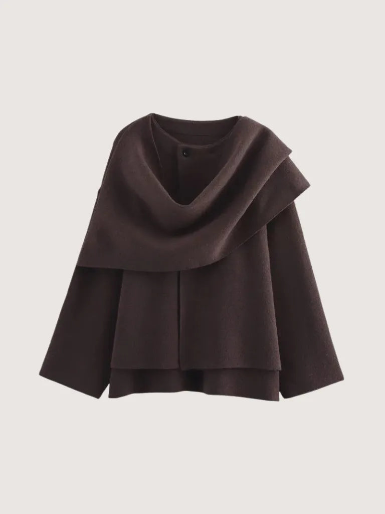 Brown poncho on a light gray background