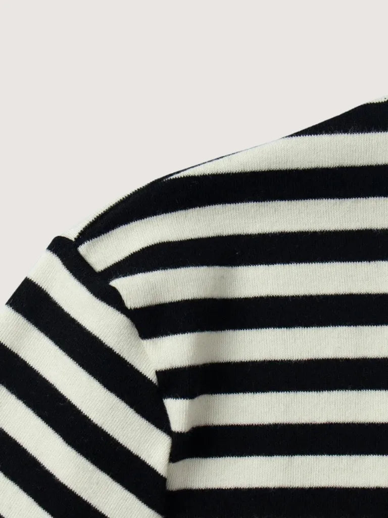 Close-up of a black and white striped fabric texture.