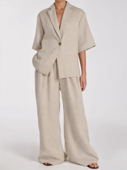 Beige suit with wide-leg pants on a white background
