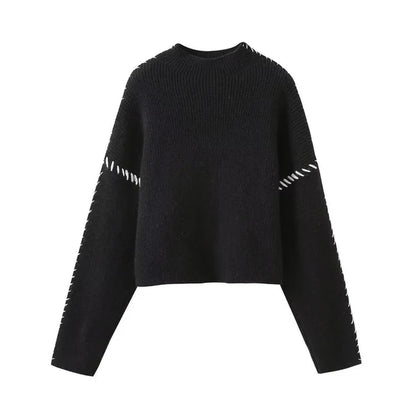 Black sweater with white striped sleeves on a white background