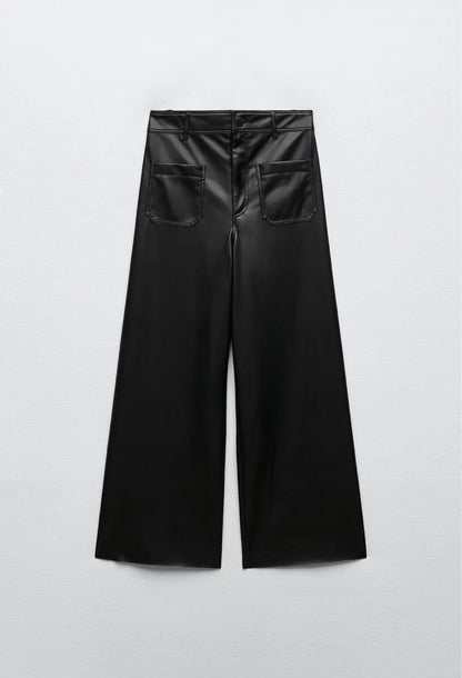 Black wide-leg pants on a light gray background