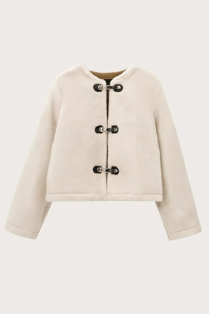 Beige jacket with button details on a white background