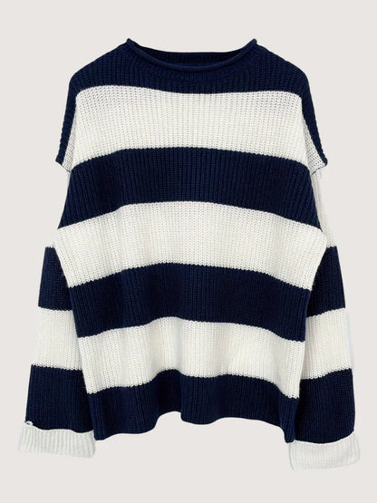 Navy and white striped sweater on a light gray background