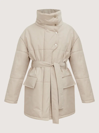 Beige puffer coat with a belt on a light gray background