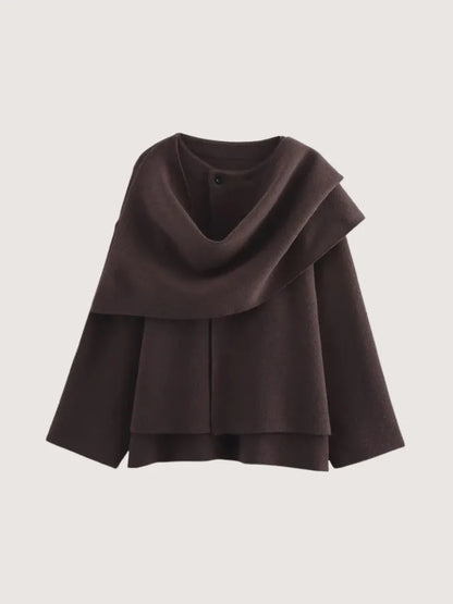 Brown poncho on a light gray background