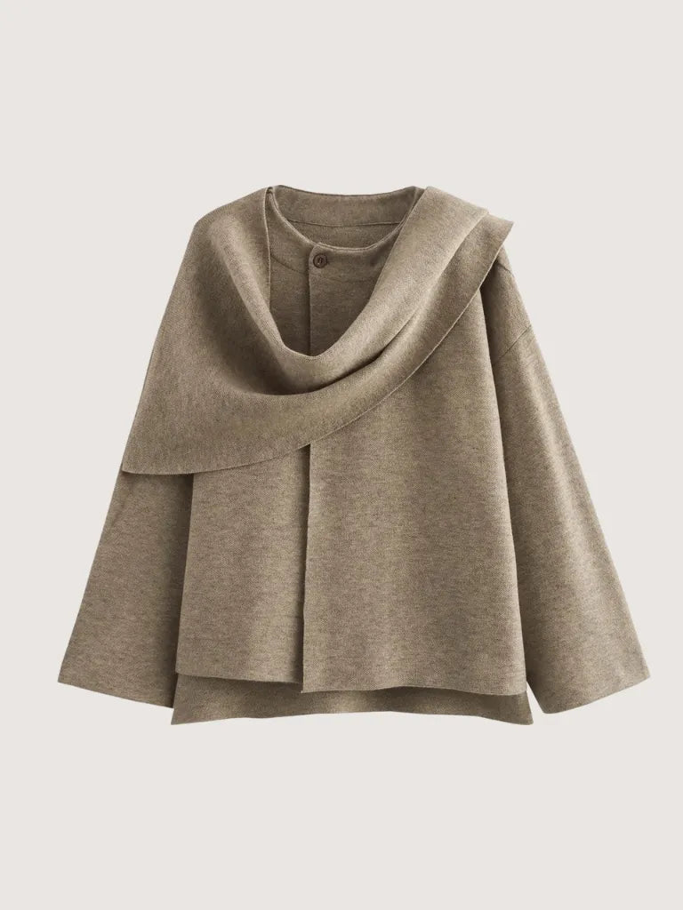 Brown cape on a light gray background